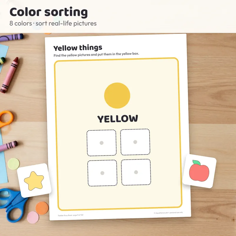 Close-up of a toddler busy book page with velcro picture cards